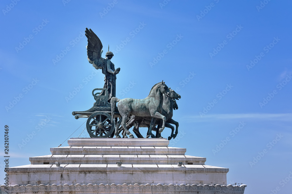 Quadriga on top of Monument Vittorio Emanuele II in Rome. Statue of goddess Victoria riding on quadriga