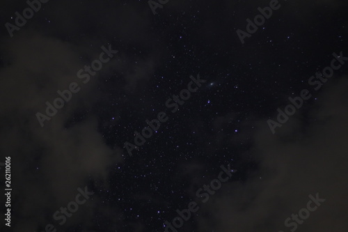 Fototapeta Naklejka Na Ścianę i Meble -  Andromeda Galaxy on a Cloudy Sky