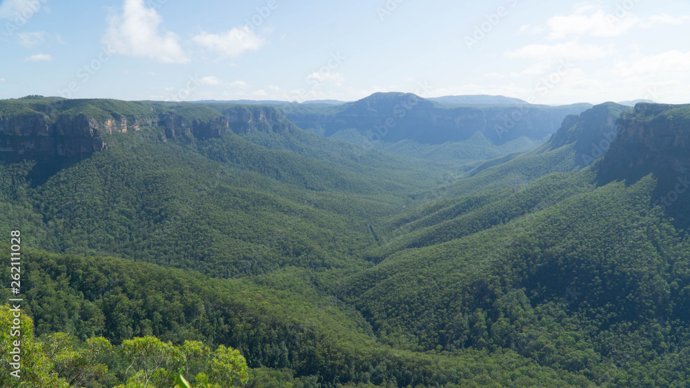 Naklejka premium Famous The Blue Mountains National Park with its blue mist above eucalyptus trees, Australia