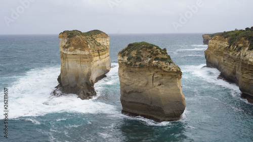 Two isolated cliffs and rock formations along The Great Ocean Road, caused by water erosion, Australia
