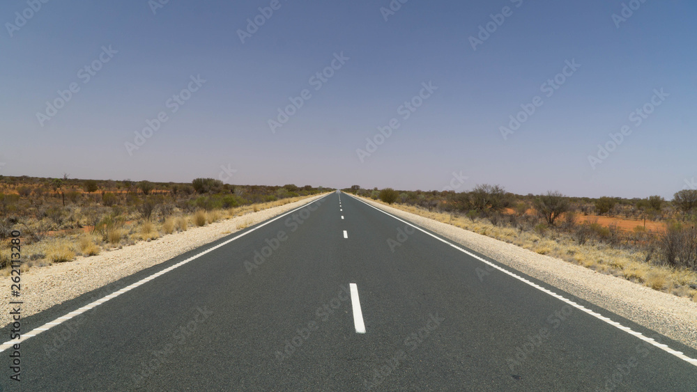 Naklejka premium Scenic view of Stuart Highway between Adelaide and Darwin, Outback, Australia
