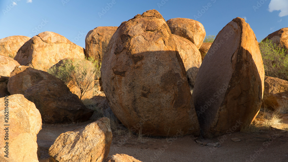Devils Marbles - magical red boulders in Red Center during late afternoon, Australia