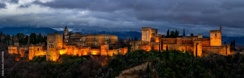 Panoramic Night view at Alhambra palace and fortress complex. Arabic fortress of Alhambra, Granada, Spain