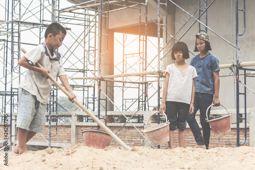 Children working at construction site for world day against child labour concept: © AungMyo