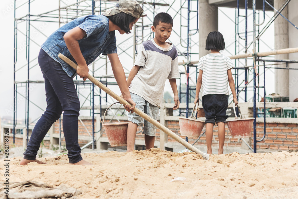 Children working at construction site for world day against child labour concept: Children working at construction site for world day against child labour concept: