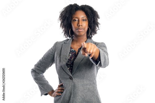 Black African American female businesswoman isolated on a white background pointing forward