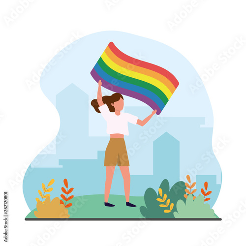 woman with rainbow flag to freedom parade