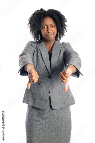 Black African American female businesswoman isolated on a white background gesturing thumbs down photo