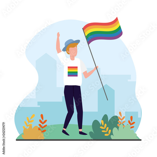 man with rainbow flag to lgbt celebration