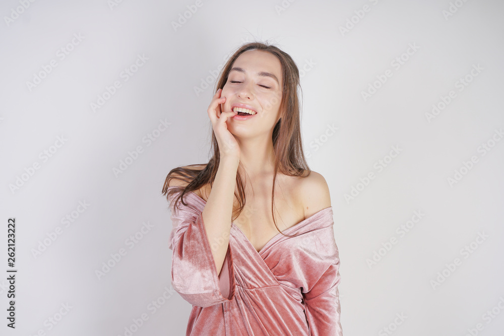 cute caucasian teen girl is surprised on white background in Studio cute caucasian teen girl is surprised on white background in Studio