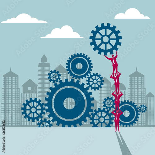 Teamwork concept, a group of businessmen lifting gears.