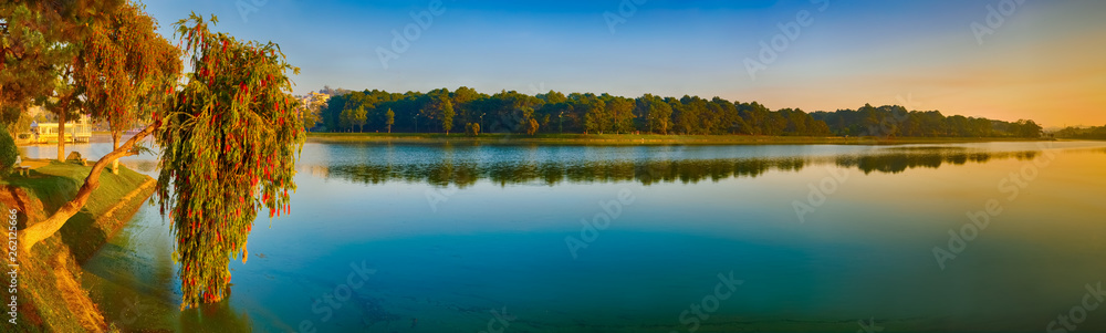 Sunrise over Xuan Huong Lake, Dalat, Vietnam. Panorama Sunrise over Xuan Huong Lake, Dalat, Vietnam. Panorama