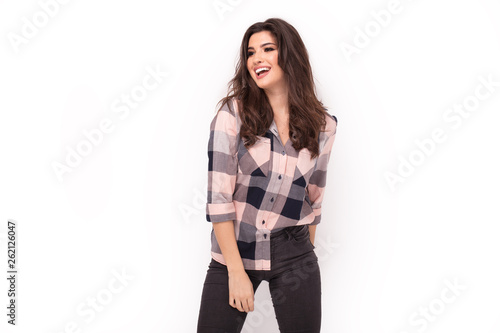 Portrait of smiling happy girl over white background.