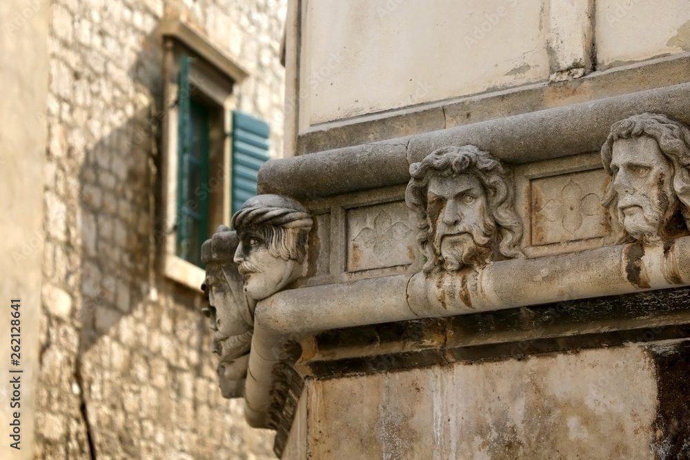 Decorative details of historic renaissance Cathedral of St. James, famous UNESCO World Heritage Site in Sibenik, Croatia. 