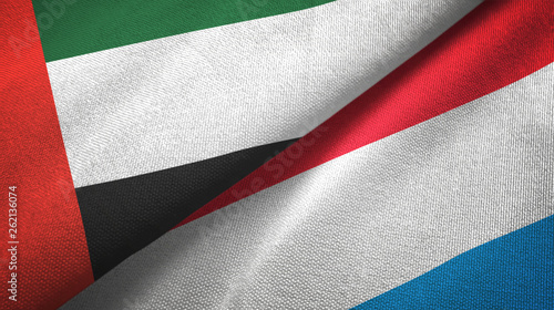 United Arab Emirates and Luxembourg two flags textile cloth  fabric texture