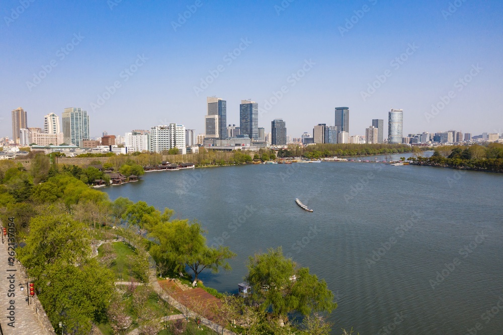 Skyline of Nanjing city in a sunny day in spring . Skyline of Nanjing city in a sunny day in spring .