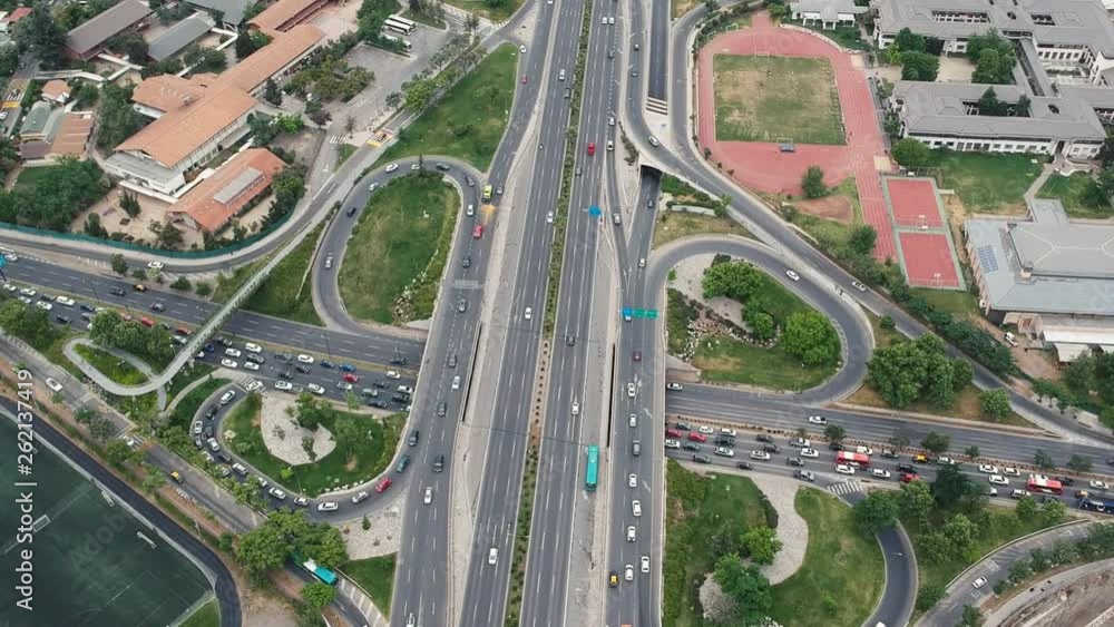 Panoramic view from a drone staying still, of a highway with a lot of transit in a beautiful day. Panoramic view from a drone staying still, of a highway with a lot of transit in a beautiful day.