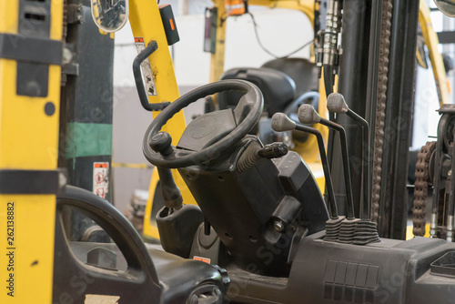 Forklifts in warehouse