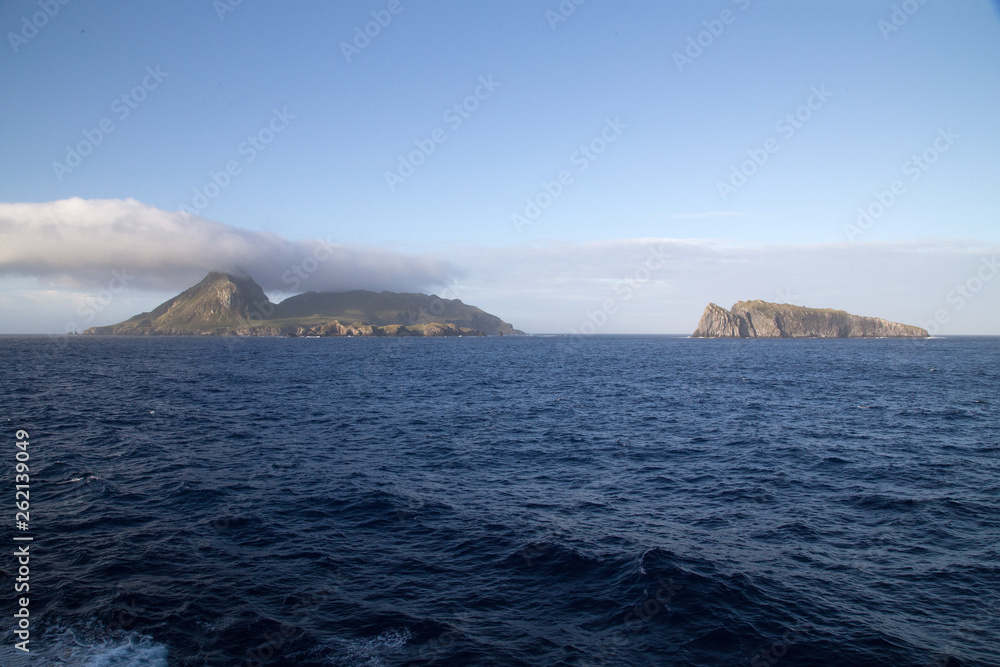 The stunning Nightingale Island with an amazing cloud formation of a blue sea. 