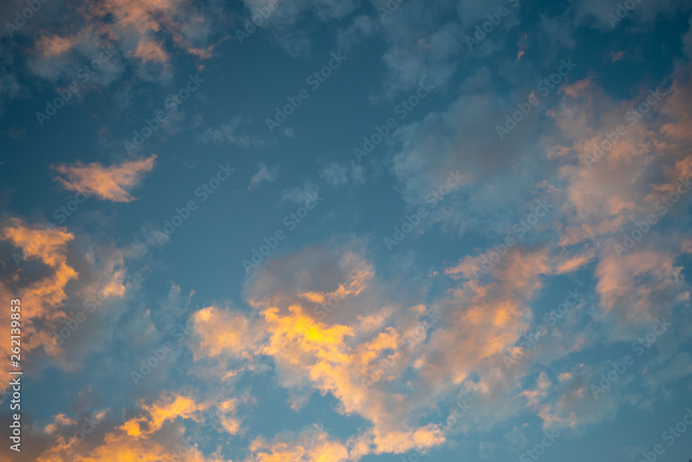 Beautiful romantic cumulus sunset clouds in twilight time for background, wallpaper