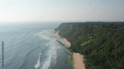 Aerial perspective of niang niang beach in Uluwatu, Bali photo