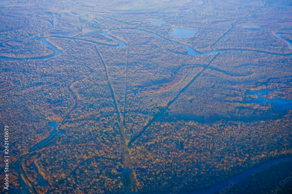 Fototapeta premium Aerial view of blue river of Houston Suburban 