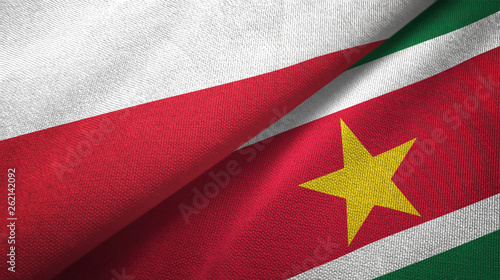 Poland and Suriname two flags textile cloth, fabric texture