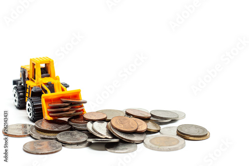 A yellow toy bulldozer with...