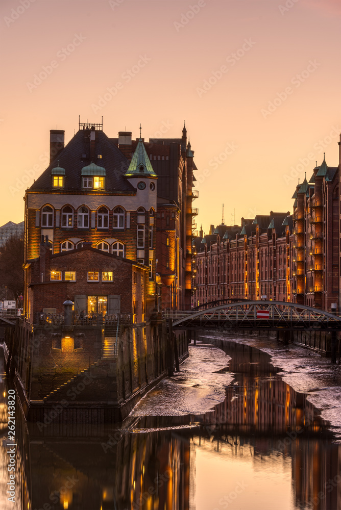 The warehouses of the old Speicherstadt in Hamburg, Germany, at sunset