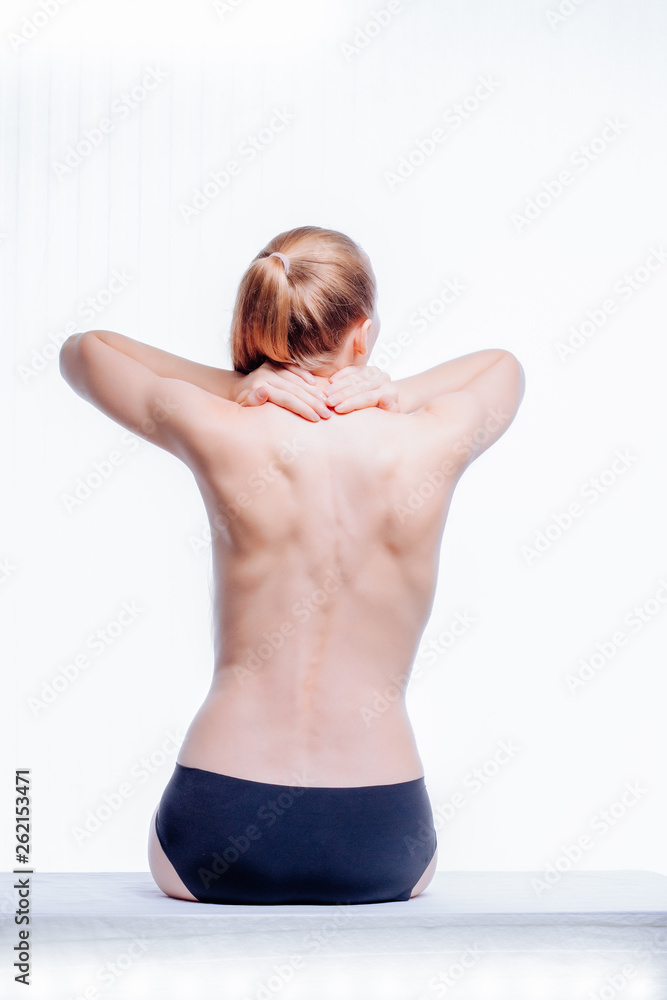 Obraz premium Back of beautiful nude woman on white background