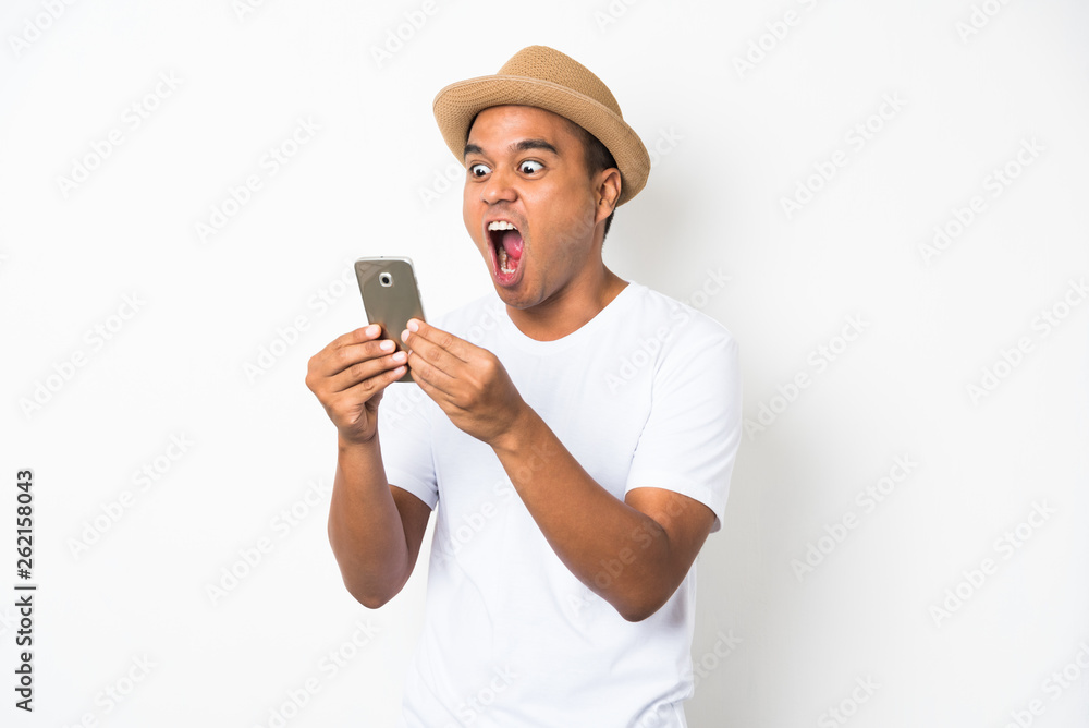 Surprised and shocked asian man looking smartphone Surprised and shocked asian man looking smartphone