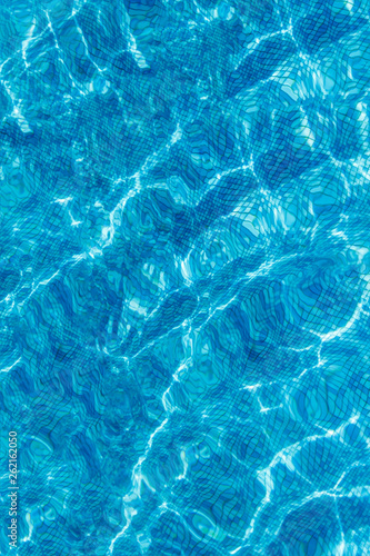 Background from bright blue like in the pool on a sunny day photo