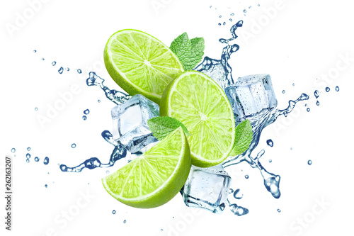 Fresh limes, mint leaves, ice cubes and water splashes, isolated on white background