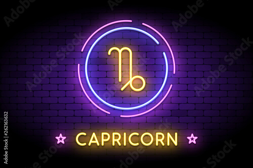 The Capricorn zodiac symbol, horoscope sign in trendy neon style on a wall. Capricorn astrology sign with light effects for web or print.