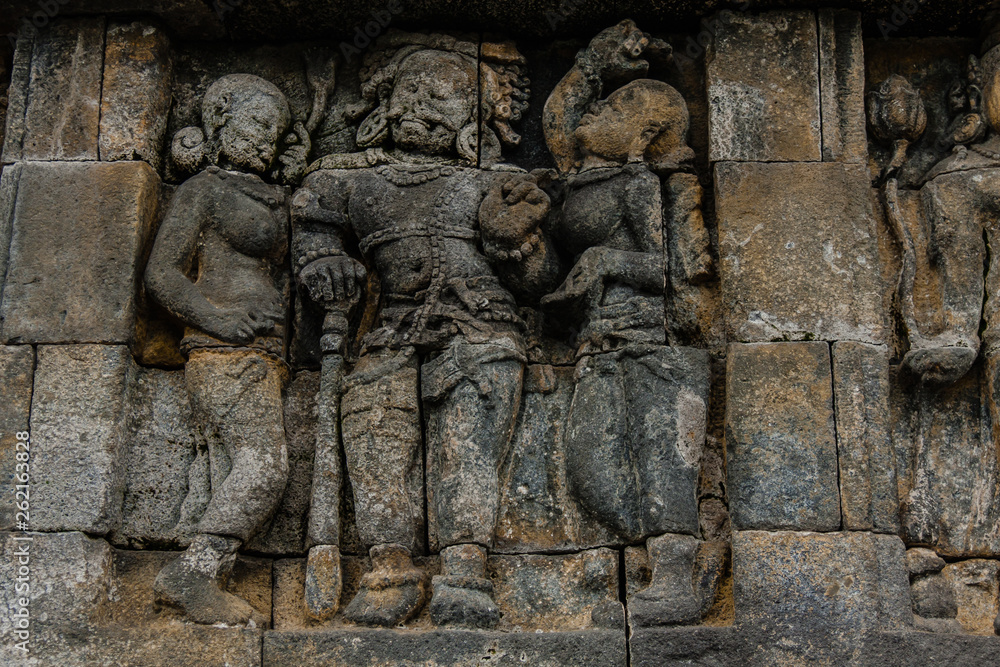 A fragment of the Borobudur Temple wall engravings, Yogyakarta, Central Java, Indonesia