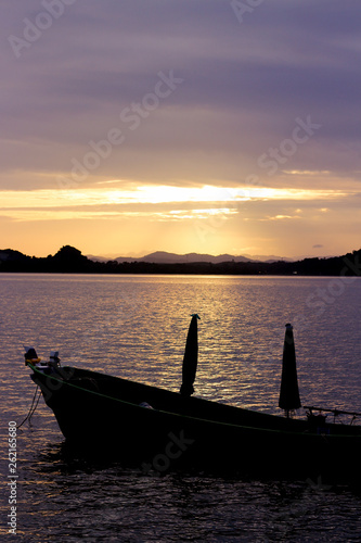 Fototapeta Naklejka Na Ścianę i Meble -  Boat on sae , The silhouette of the boats at sunset 
