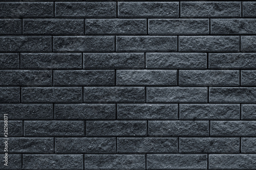 Wallpaper Mural Texture of dark gray brick wall. The wall is tiled decorative. Dark stone background of house facade. Brick wall texture grunge background.  Torontodigital.ca