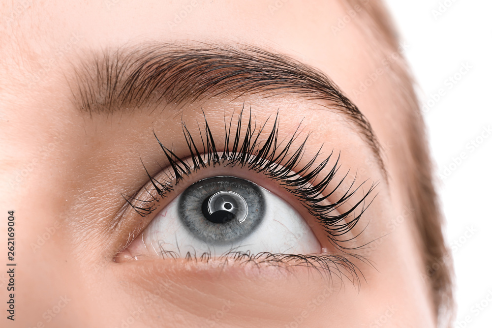 Obraz premium Beautiful young woman after eyelashes lamination, closeup