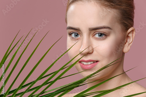 Beautiful young woman with ...