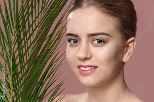 Beautiful young woman with ...