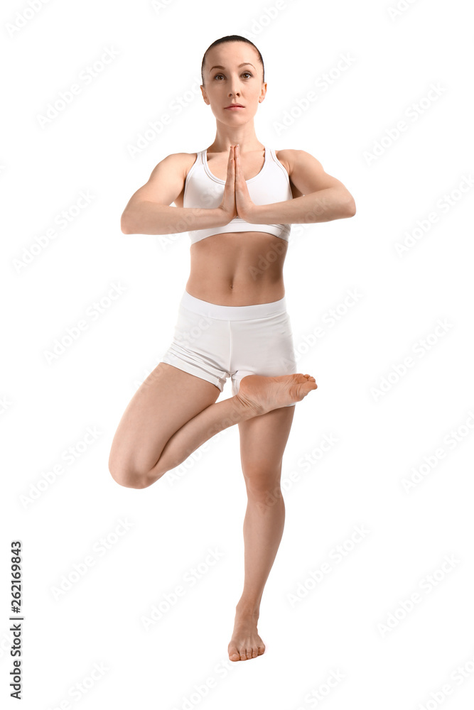 Sporty woman practicing yoga on white background Sporty woman practicing yoga on white background