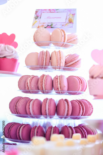 Delicious pink macaroons on stander