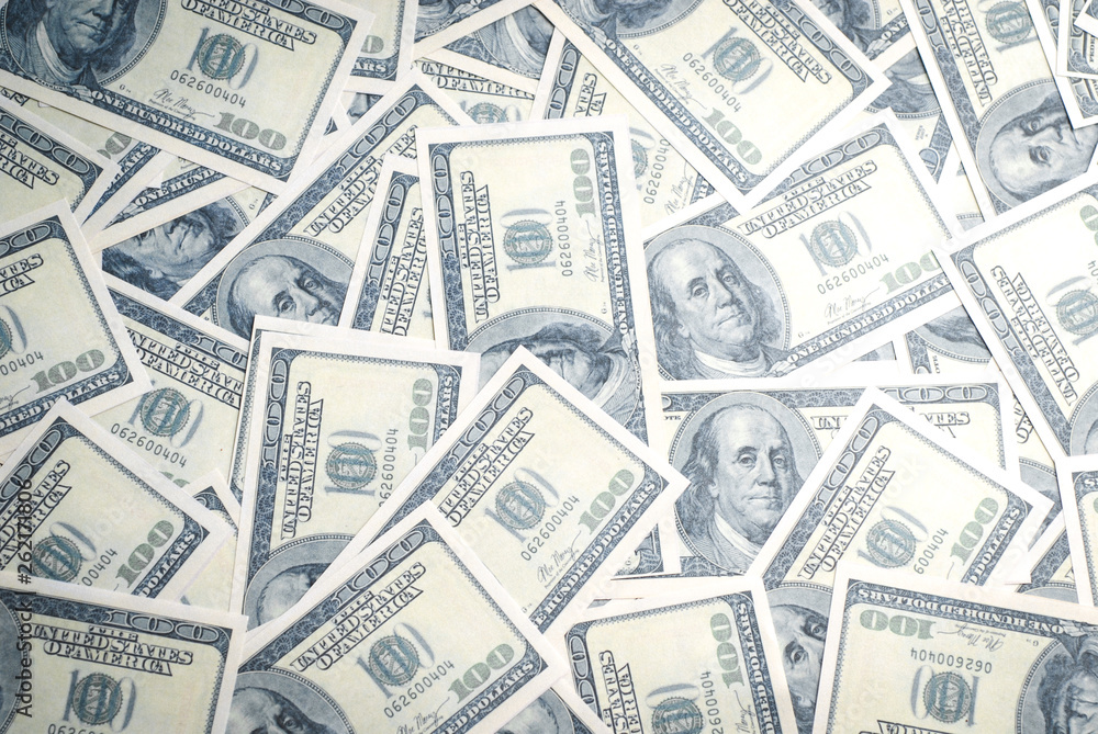 Dollar banknotes background. One hundred dollar banknotes. Money background. Dollar banknotes background. One hundred dollar banknotes. Money background.