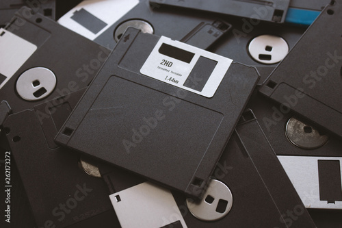 blank floppy disks with soft-focus and over light in the background photo