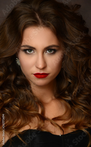 Beauty Model Woman with Long Brown Wavy Hair