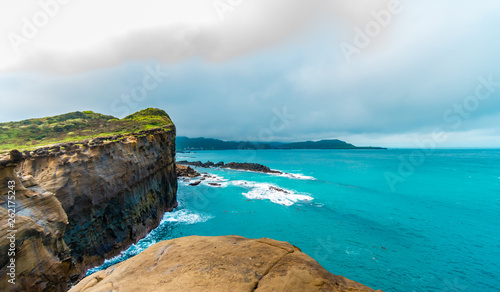 Beautiful seaside stone under the gloomy sky background. holiday concept. BEIJING  CHINA