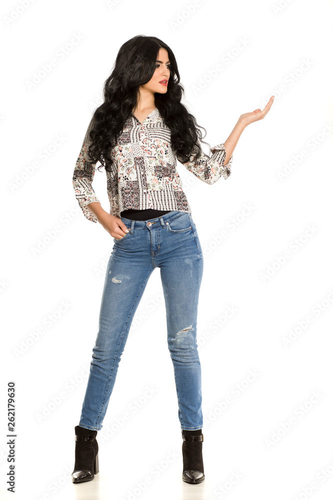 a woman holding imaginary object in her arm on white bacground a woman holding imaginary object in her arm on white bacground