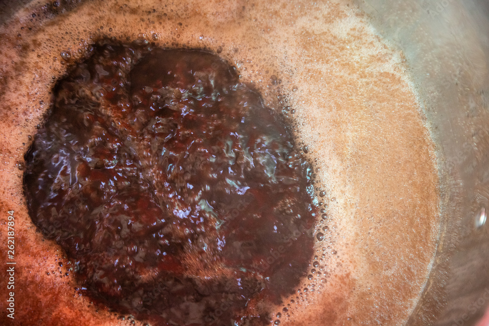 Fototapeta premium Beer wort starting to boil, Wort for Home Brew Wheat Beer.