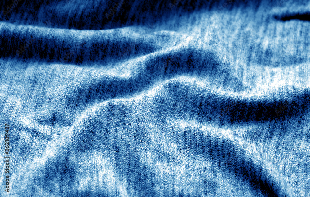 Textile texture with blur effect in navy blue color. Textile texture with blur effect in navy blue color.