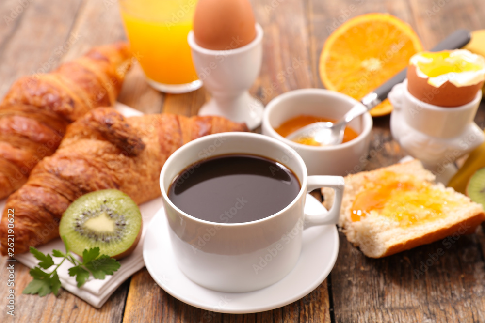 breakfast meal with coffee, egg and croissant breakfast meal with coffee, egg and croissant